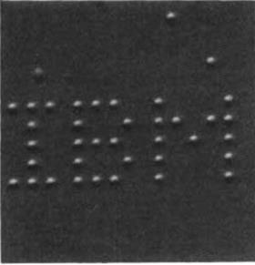 A image showing I B M written in dots