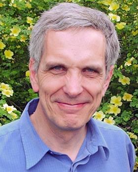 Portrait of David Clary, an Emeritus professor of chemistry at the University of Oxford