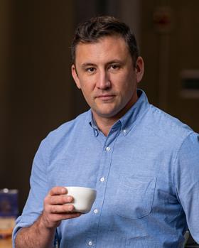 Portrait of Christopher Hendon, computational chemist and coffee scientist at the University of Oregon