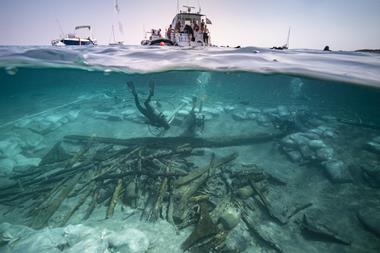 Half underwater shot of ship and Roman shipwreck