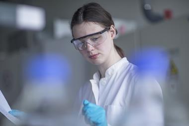 An image showing a researcher in the lab