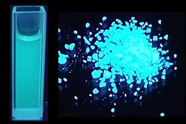 A photograph of a coumarin compound fluorescing with a bright blue colour