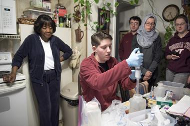 An image showing water testing being done by a citizen science project in Flint