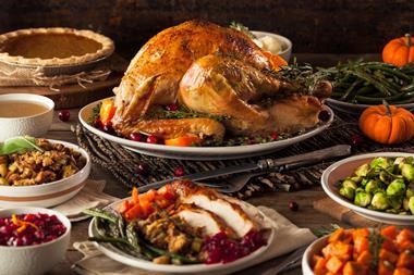 Thanksgiving dinner spread with a roast turkey