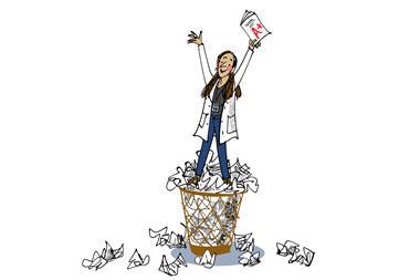 Woman on top of bin with crumpled paper