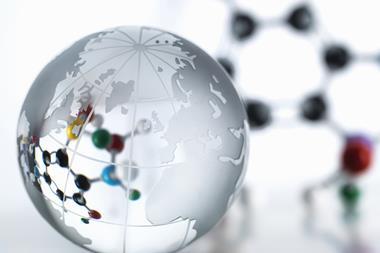 An image showing a world globe and a molecular model