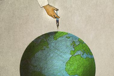 An images showing a hand injecting the globe