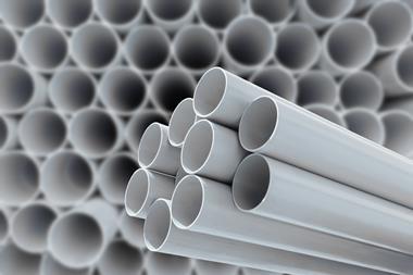 PVC pipes stacked in a warehouse