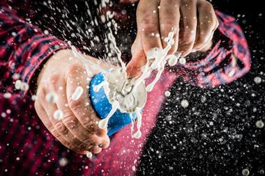 A can of fizzy drink bursting open