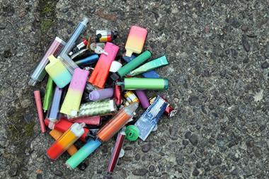 A photograph of discarded vapes on the street