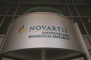 Novartis signage at the Institute for BioMedical Research building in Cambridge, Massachusetts, US
