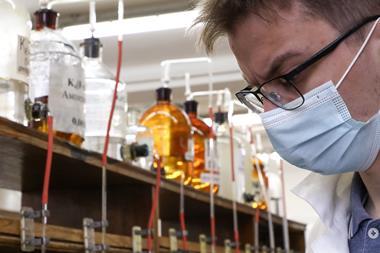 An image showing a young person in a lab