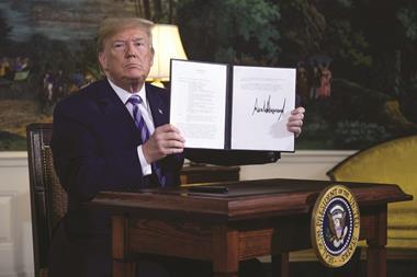 President Trump holding National Security Presidential Memorandum