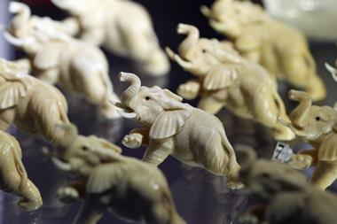 A photo of elephant figurines made of ivory