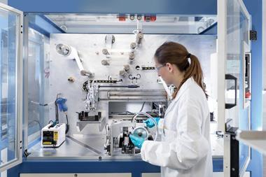 Scientist making batteries