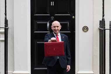 Chancellor holding red budget box