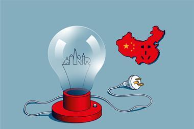 A British lightbulb unplugged from a Chinese socket