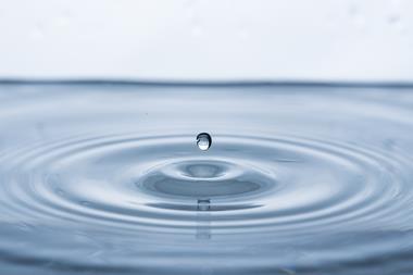 Droplet falling into water