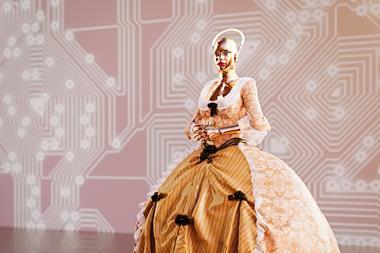A picture showing a female cyborg wearing ball gown