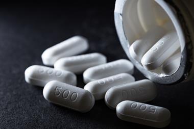 Paracetamol tablets against a dark background 
