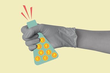 Gloved hand holding conical flask with currency signs
