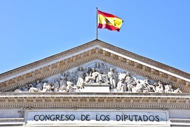 Spanish parliament building in Madrid with Spanish flag