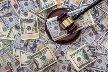 A judge's gavel and a pile of cash
