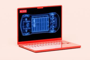 Red laptop with an X-ray of a car battery on the screen and the live button