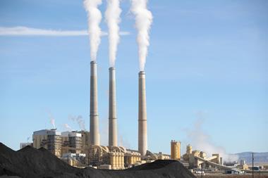 An image showing PacifiCorp's Hunter coal fired power pant releases steam as it burns coal outside of Castle Dale, Utah