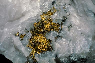 A nugget of gold trapped in quartz