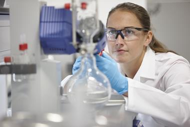 PhD student using rotavap