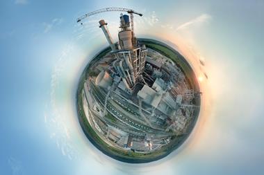 Planet earth with cement factory tower