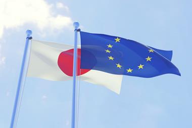 The EU and Japan flags fluttering in the wind