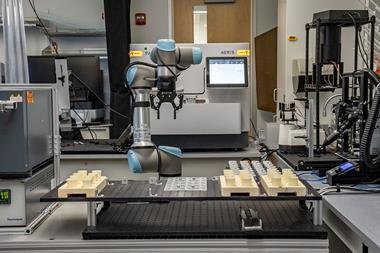 A robotic arm at work in a modern laboratory