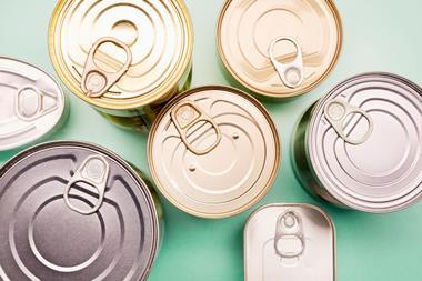 Different sized and shaped tins of food