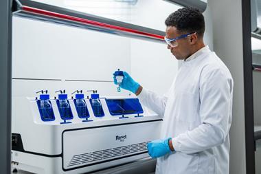 Photograph of a researcher using the Technobis ReactALL in a laboratory