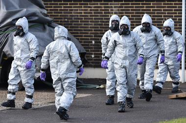 People in hazmat suits