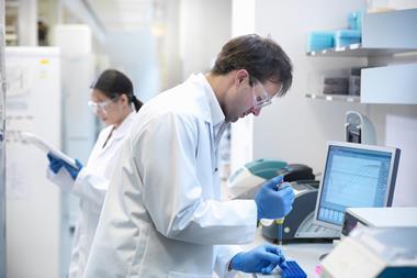 Research scientists in laboratory