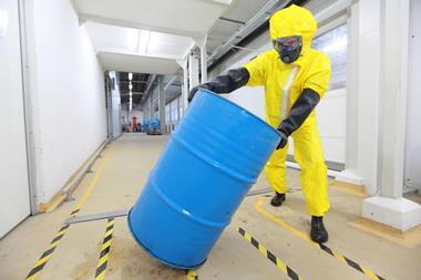 Rolling a barrel of chemicals