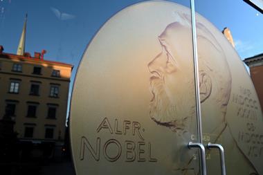 Portrait of Alfred Nobel at door entrance in the Nobel Prize Museum is located in the Old Town of Stockholm