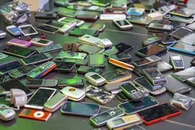 A collection of old mobile phones for recycling