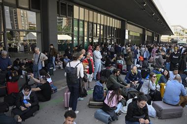 People outside Barcelona Sant rail station during a massive power cut