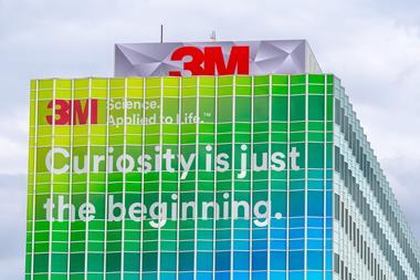 The headquarters of 3M company with a sign saying Curiosity is just the beginning