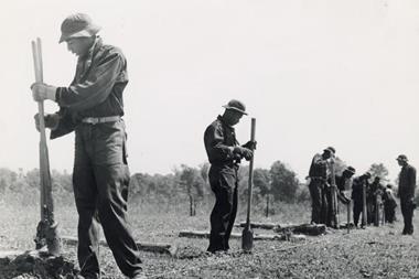 Civilian conservation corps (CCC) putting up a fence