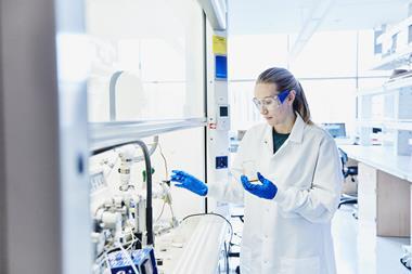 An image showing a scientist in the lab