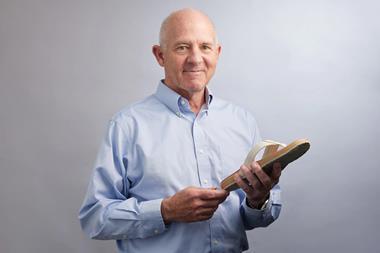 Stephen Mayfield holding a flipflop