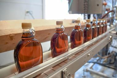 An image showing bottles of maple syrup