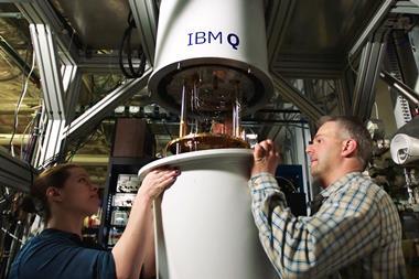 An image showing IBMers Sarah Sheldon and Pat Gumann working on a quantum dilution refrigerator