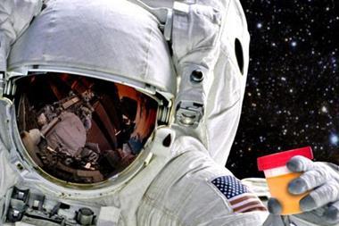 astronaut holding a urine sample