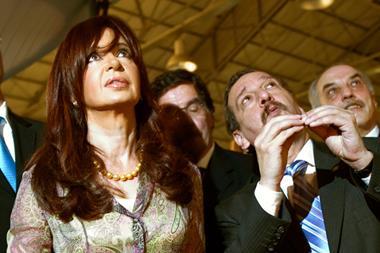 Argentina&#39;s President Cristina Fernandes de Kirchner (centre) and Argentina&#39;s Minister for Science and Technology Lino Bara&#241;ao (right) attending the inauguaration ceremony a science exhibition in 2010